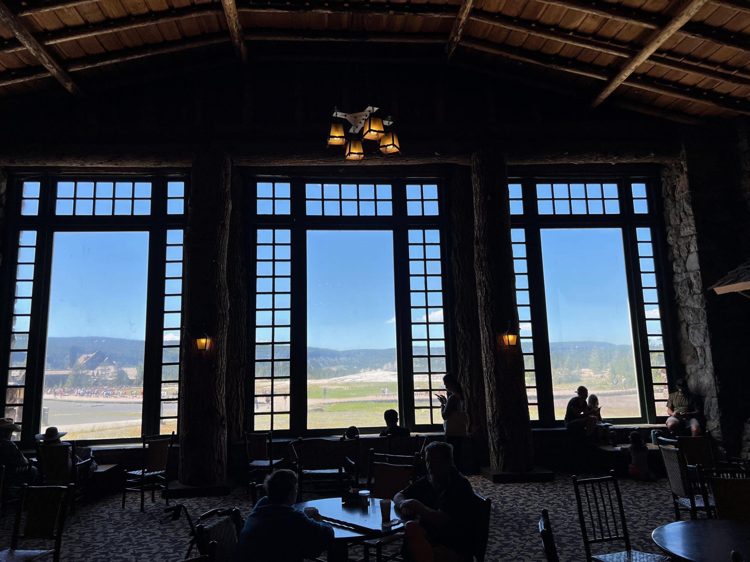 View out the windows of the Old Faithful Lodge lobby