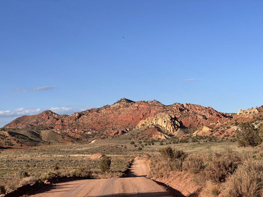 red rock valley along dirt road