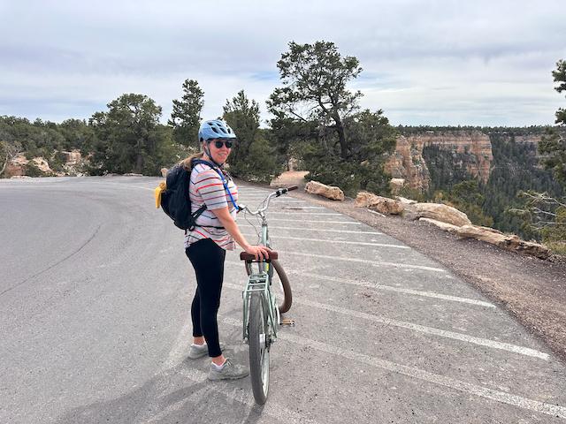 woman with rental bike at Grand Canyon