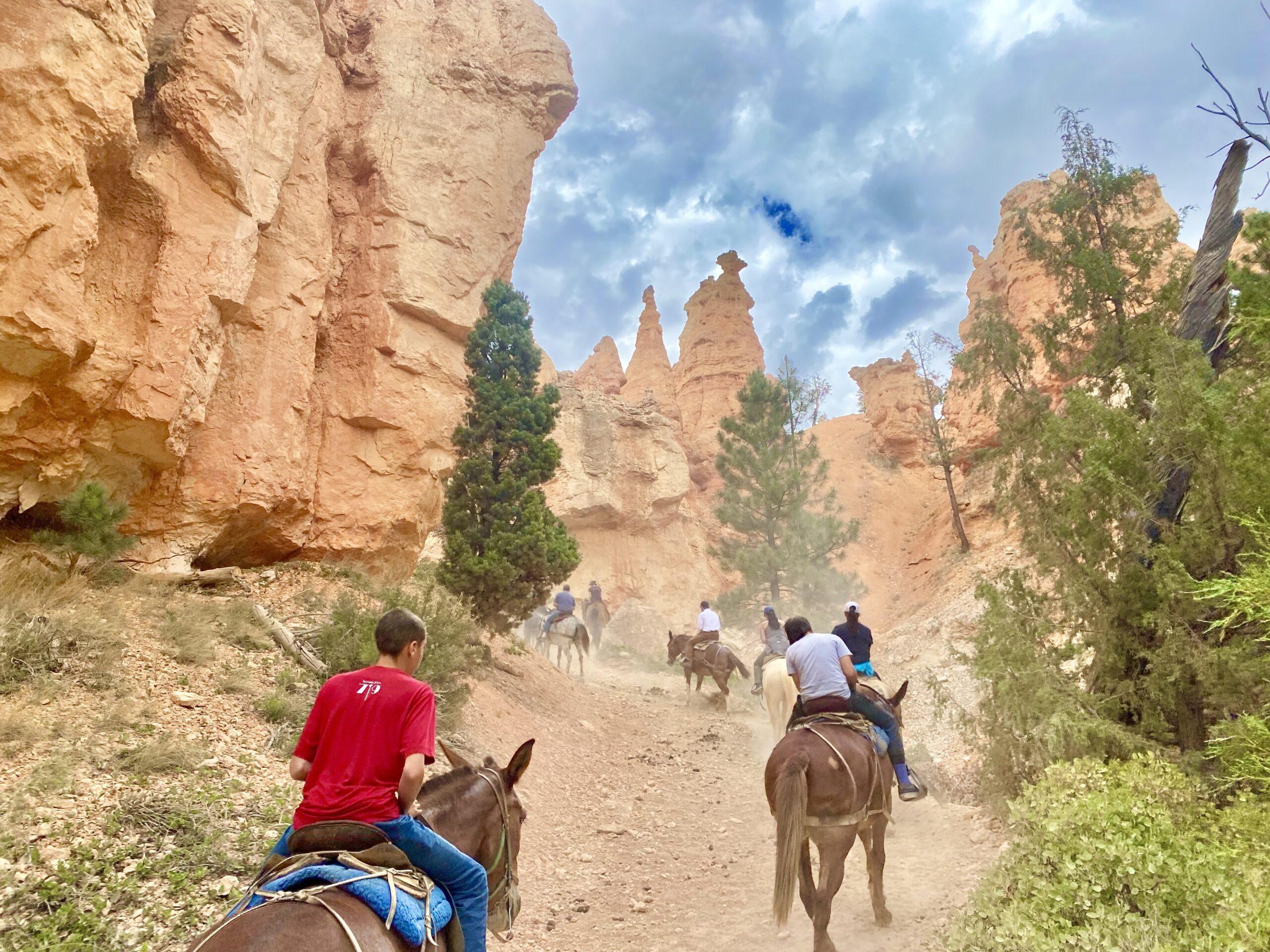 image of people riding horse in Bryce Canyon
