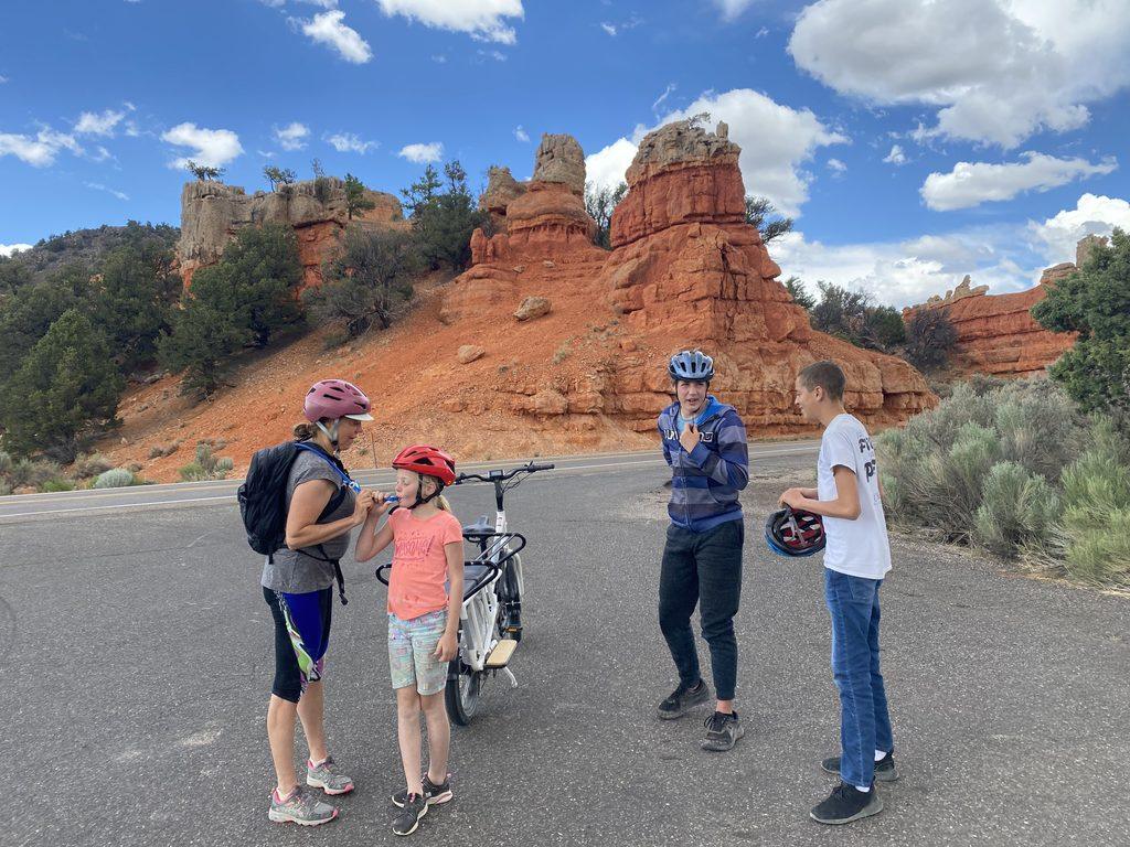 image of 4 people and bikes
