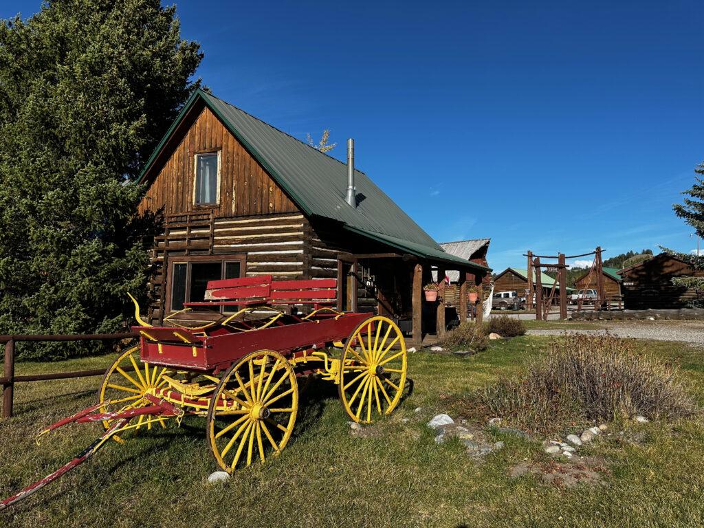 old wagon and cabin