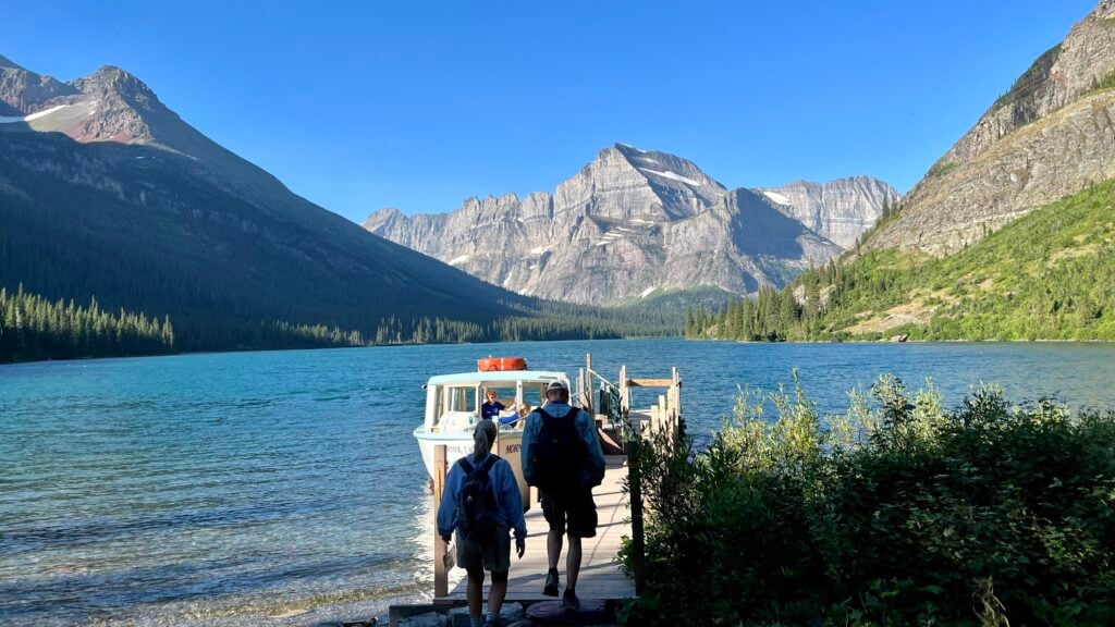 guests walking down boat dock at Lake Josephine