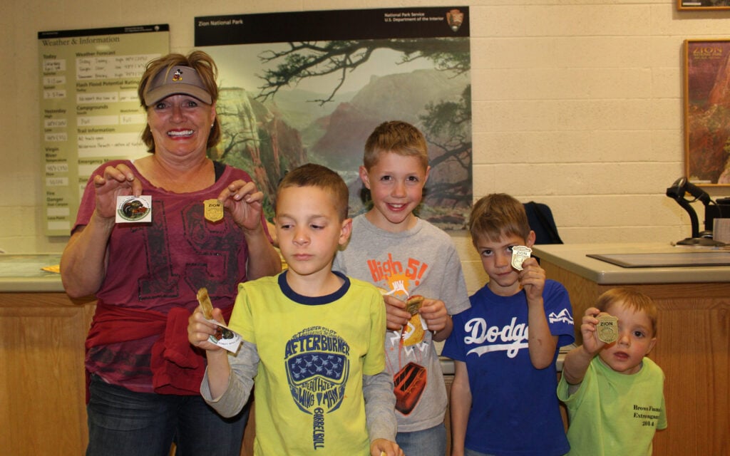 kids and grandma with Junior Ranger Badges