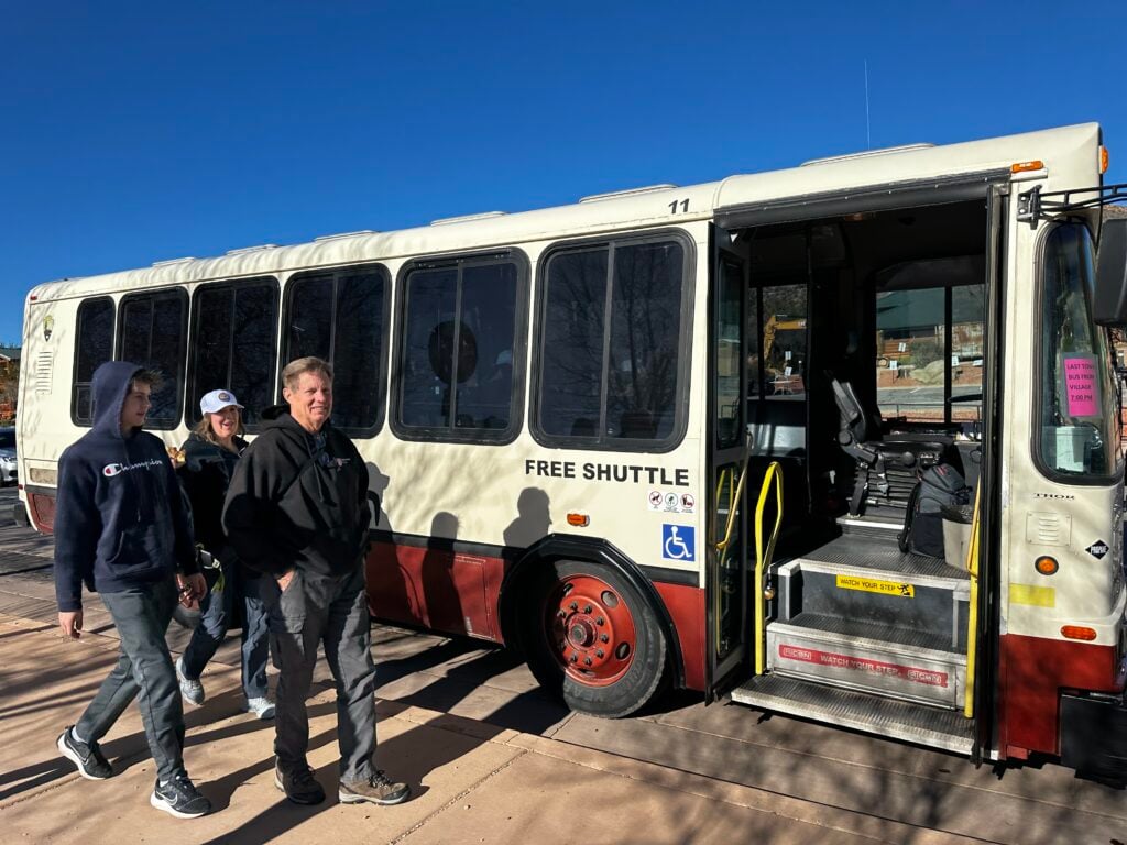 people getting on Zion shuttle