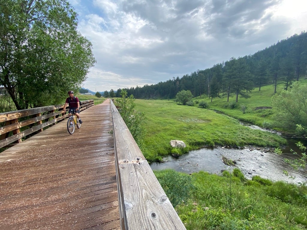 A man biking on the George S Mickleson Trail