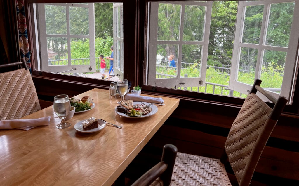 table and view out window of Russell's Fireside dining room