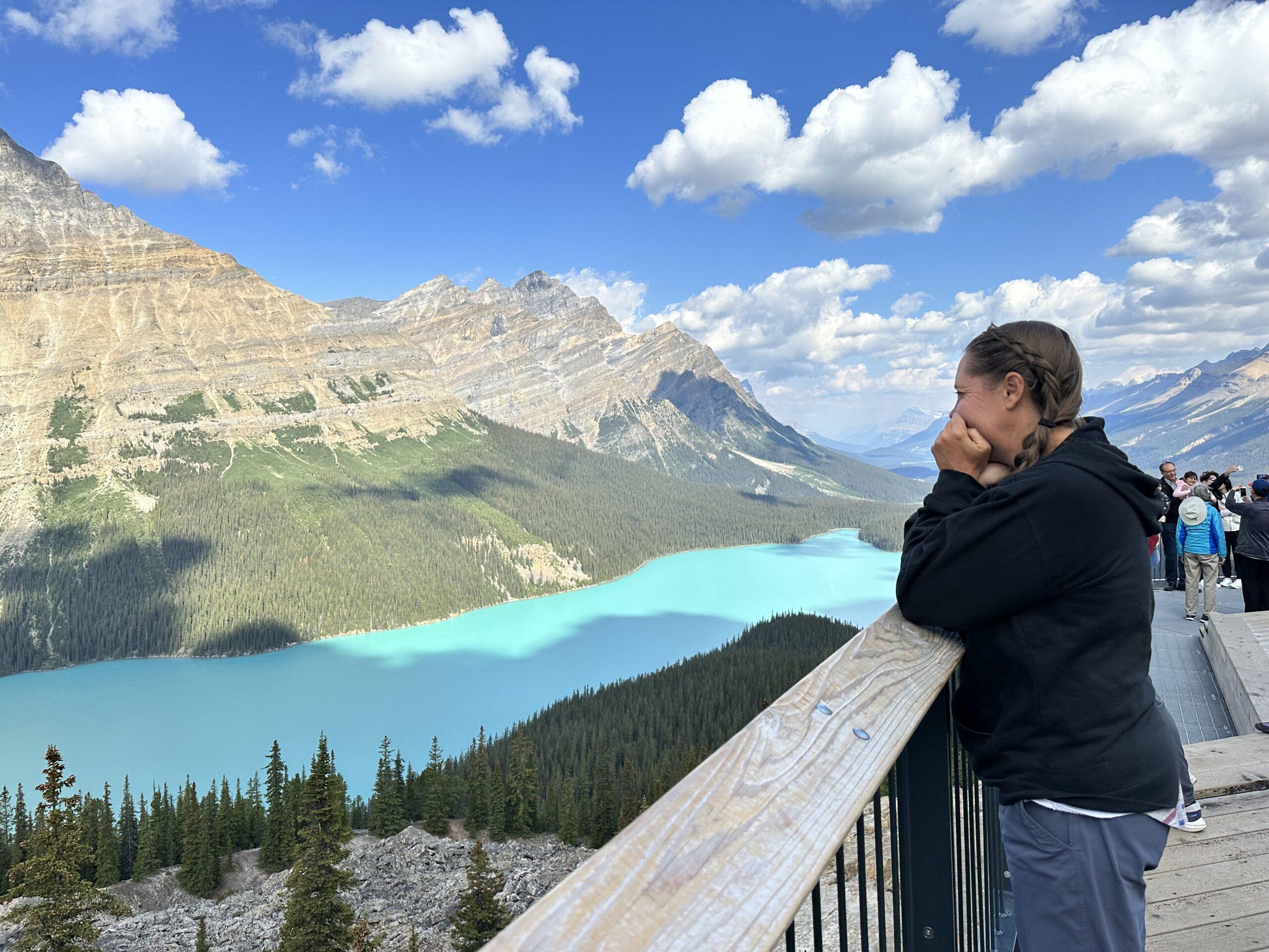 woman looking at lake