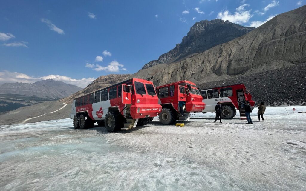 Trucks on Athabasca glacier Columbia Icefields Adventure
