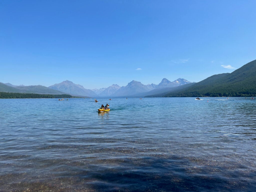 people kayaking on lake