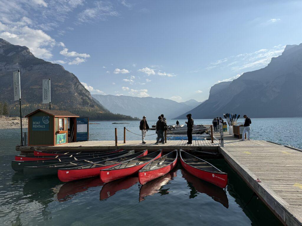 canoes tied up at dock on lake