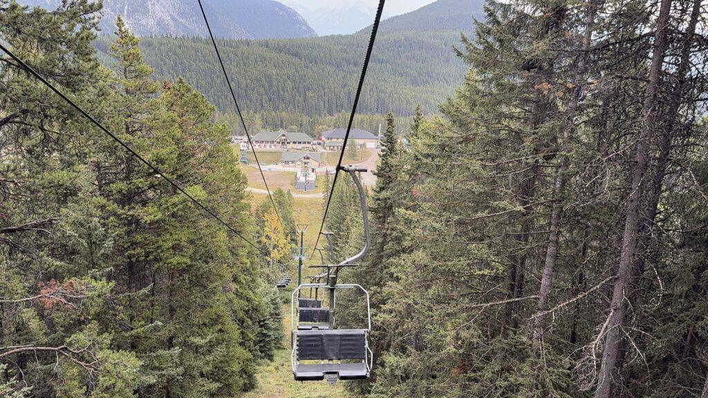 empty ski lift going up mountain