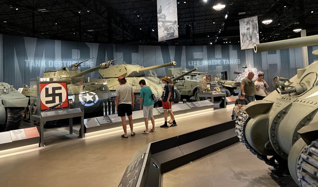 People Viewing Miltary Tanks