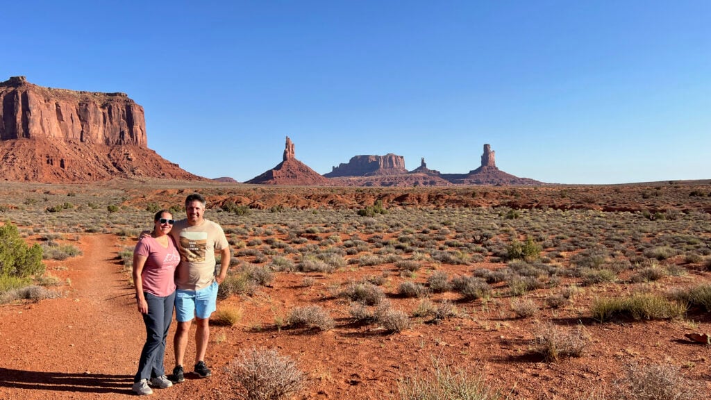 man and woman on trail in Monument Valley