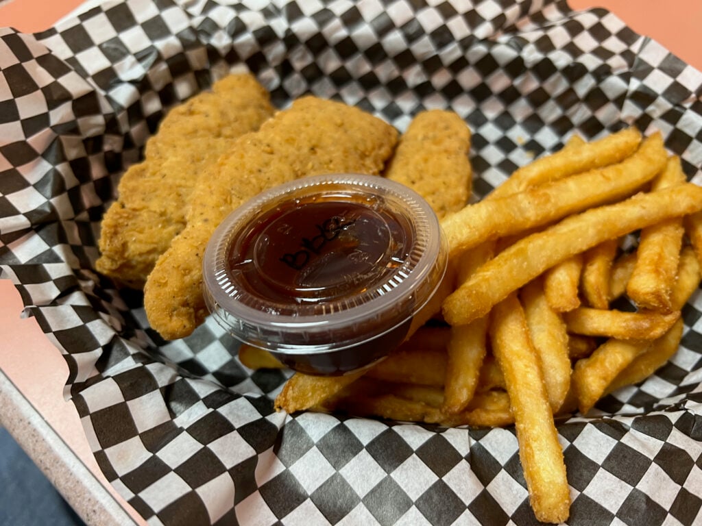 chicken strips and fries in a basket