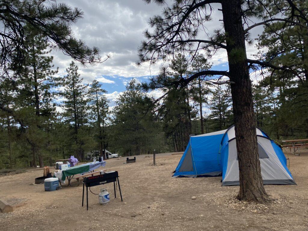 tent and picnic table in campground
