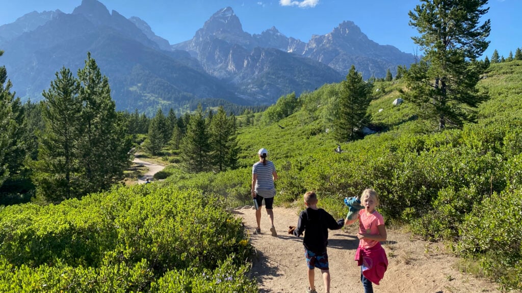 People Walking on Taggart Lake Trail