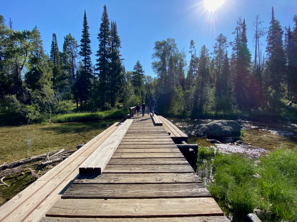 people walking on Grand Teton, Phelps Lake boardwalk