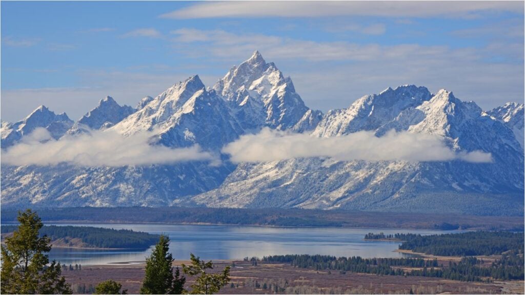 view of Teton mountain range behind Jackson Lake