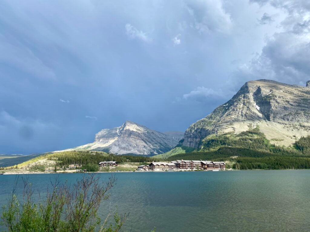 view of Many Glacier Hotel from other side of lake