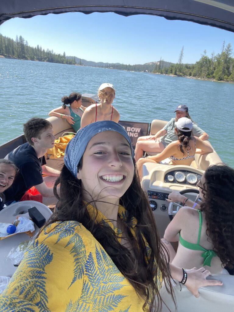 people on boat in lake