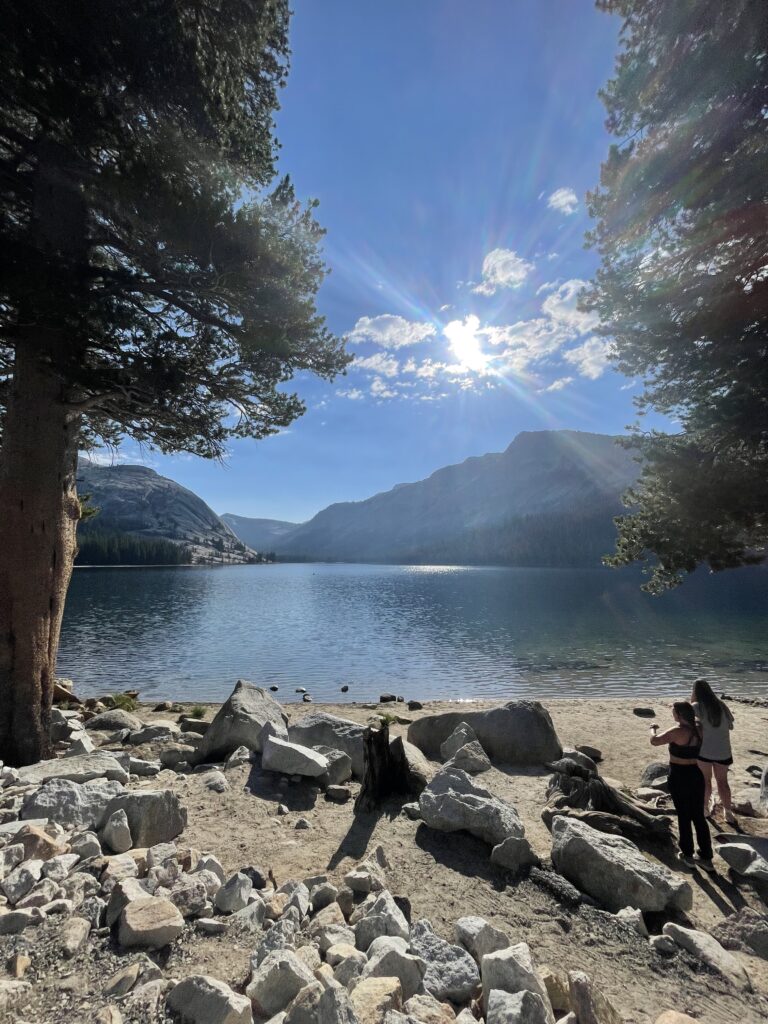 women on the banks of Tenaya Lake