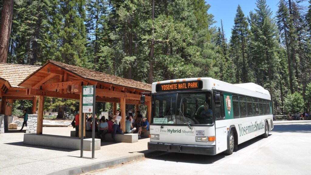 shuttle and shuttle stop in Yosemite