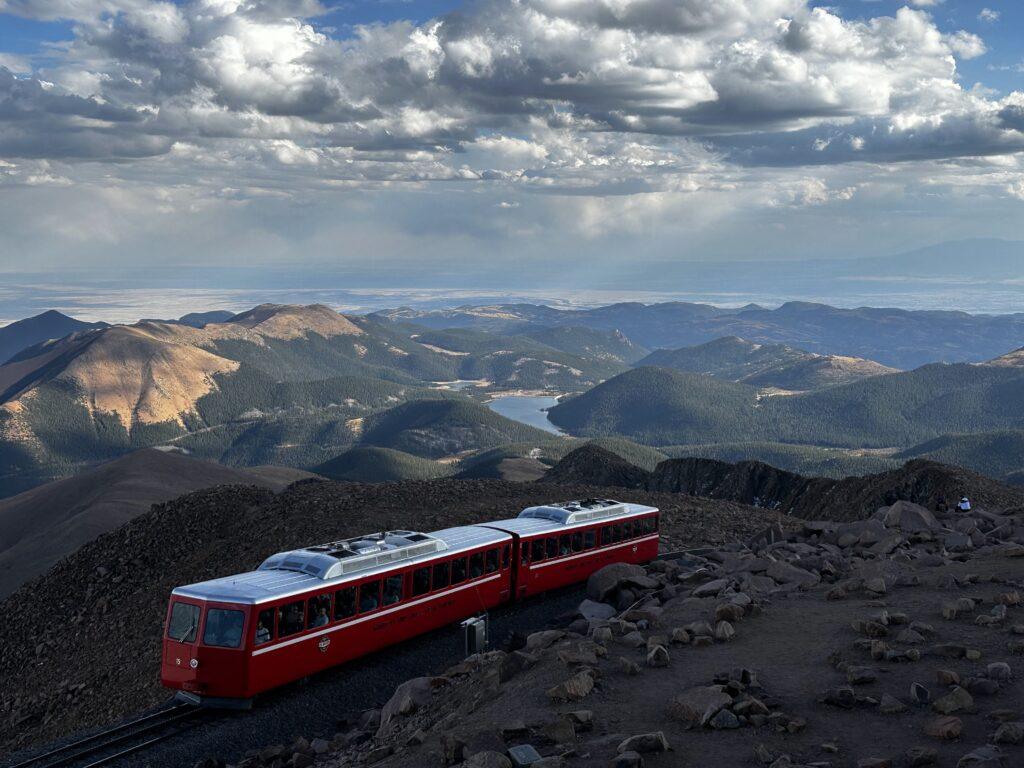 train in mountain peaks