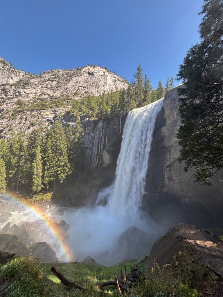 waterfall with mist rainbow