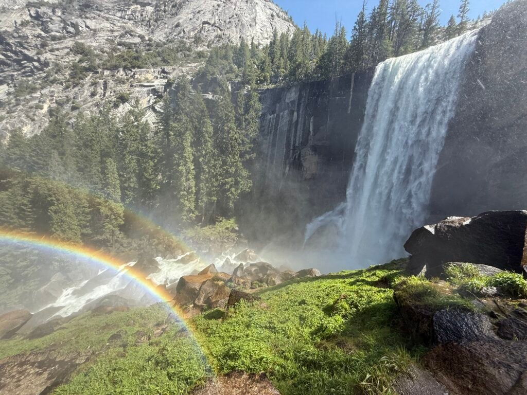 waterfall with rainbow in mist