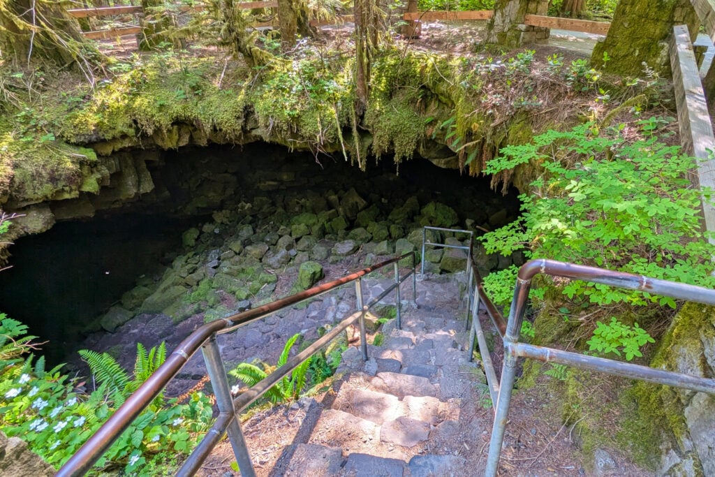 stairs leading down to cave entrance