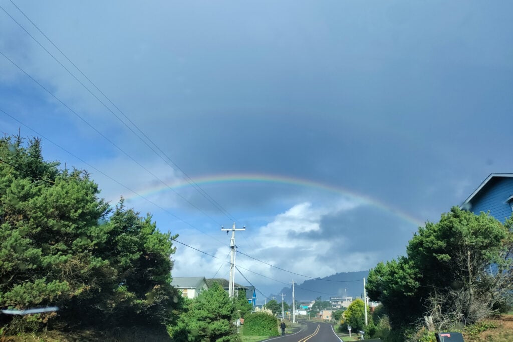 rainbow over road