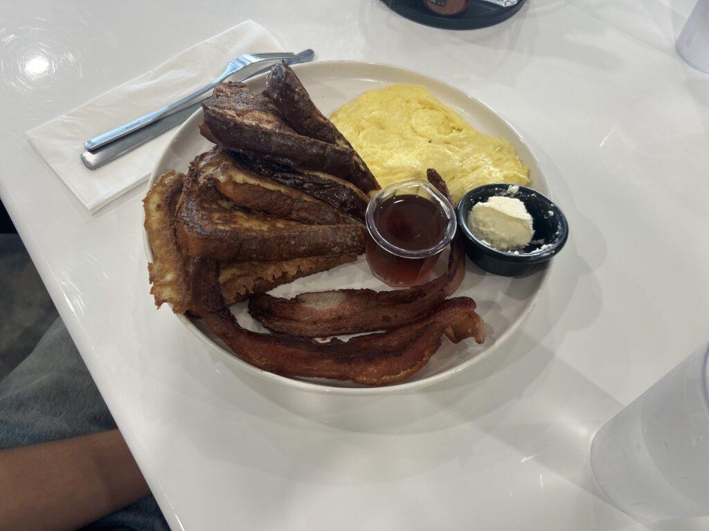 french toast, sausage, bacon, eggs