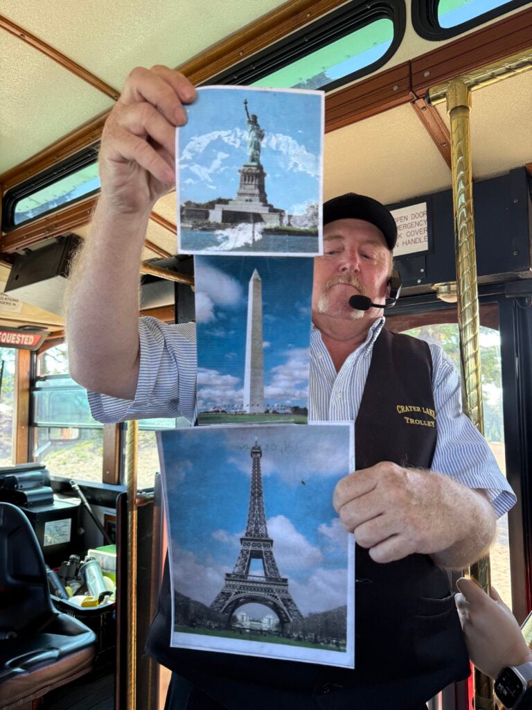 Tour guide showing pictures