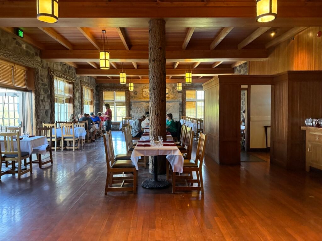 Dining room with windows and wooden pillars