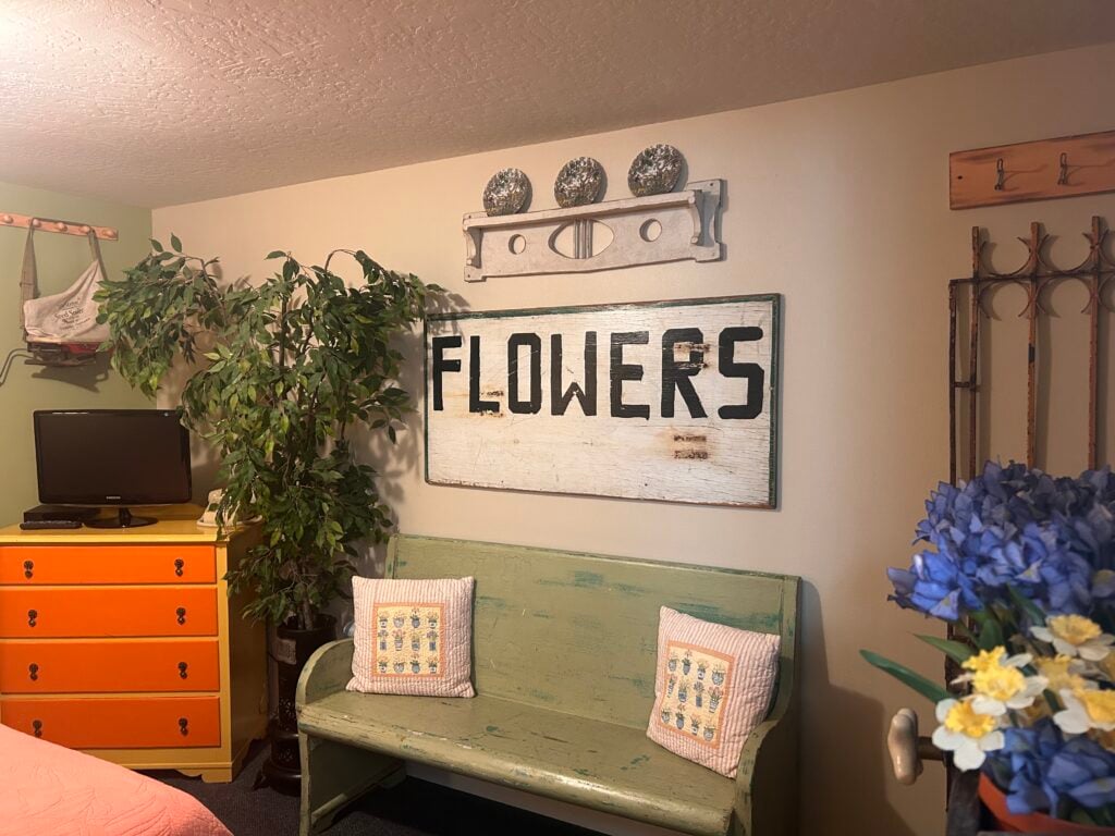 hotel room with bench and garden decor