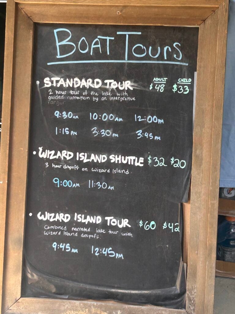 Sign with times for the boat tours