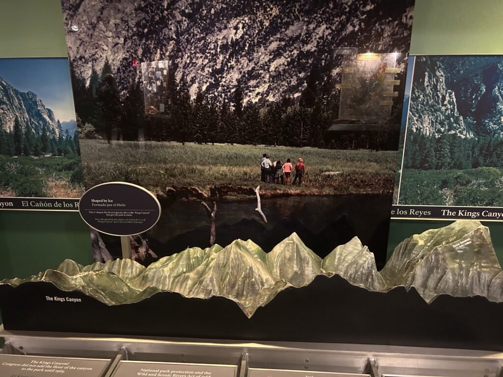 Relief map of Kings Canyon with photos in the background