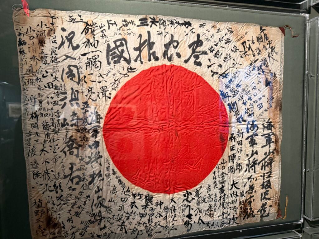 Japanese flag with writing on it
