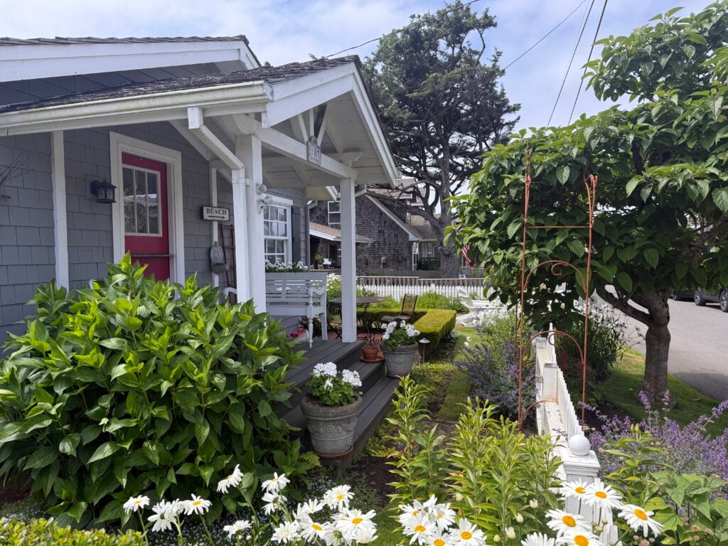 front yard and porch of small cottage