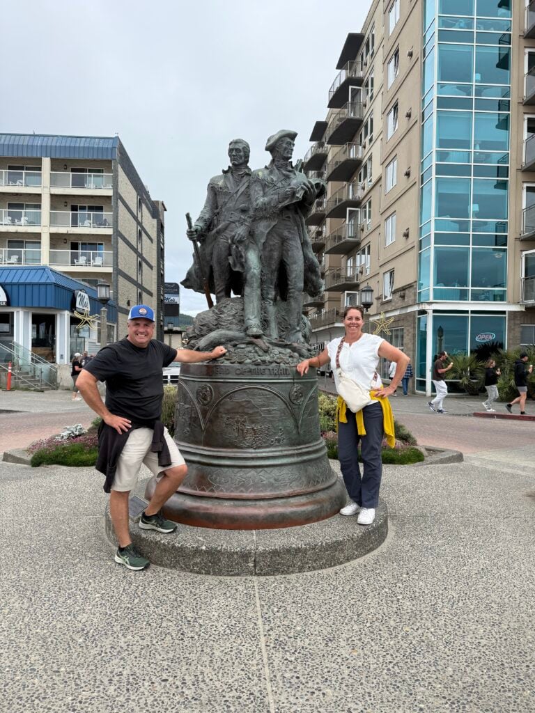 woman and man in front of Lewis and Clark statue