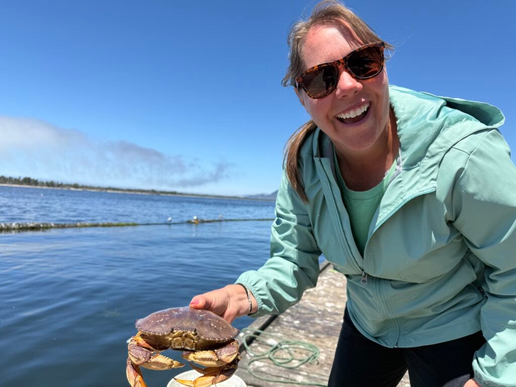 woman holding crab