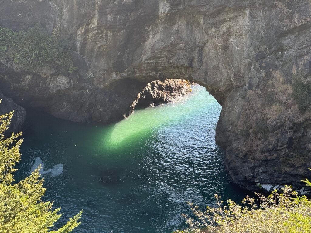 view of arch over ocean on coast