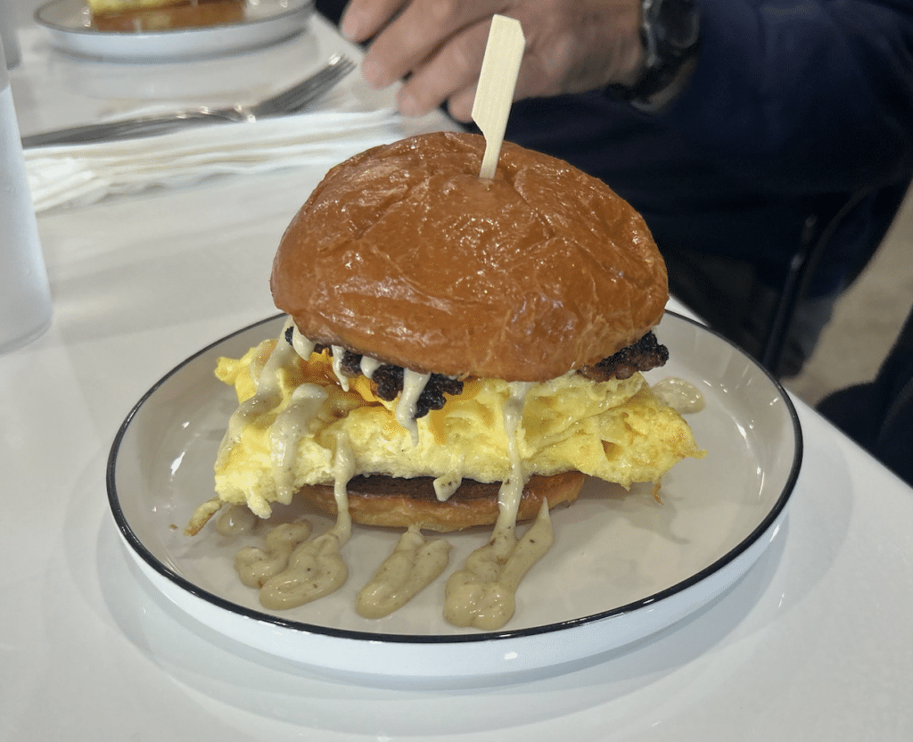 breakfast sandwich with eggs, cheese and sausage