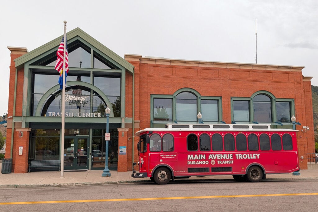 trolley in front of building