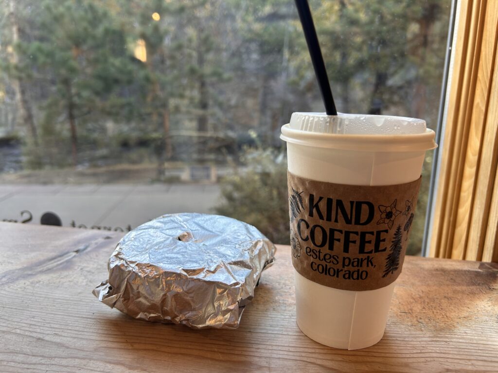 wrapped breakfast sandwich and tea