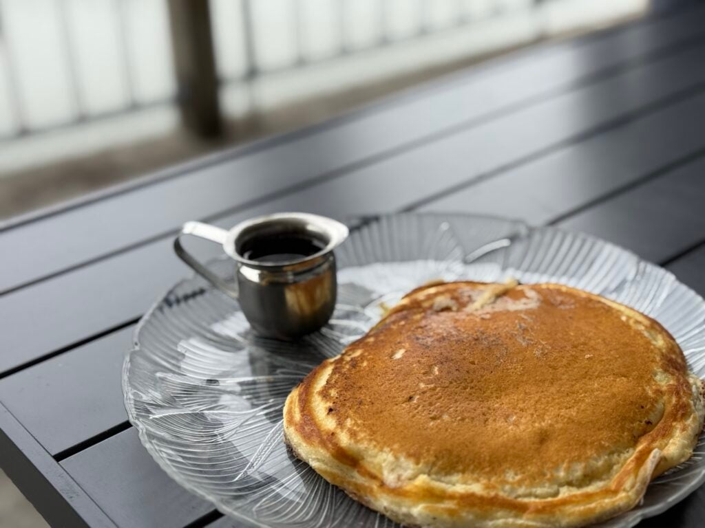 pancake and cup with syrup