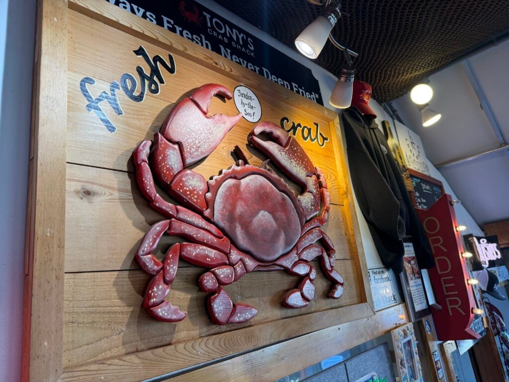 Crab sign hanging on wall