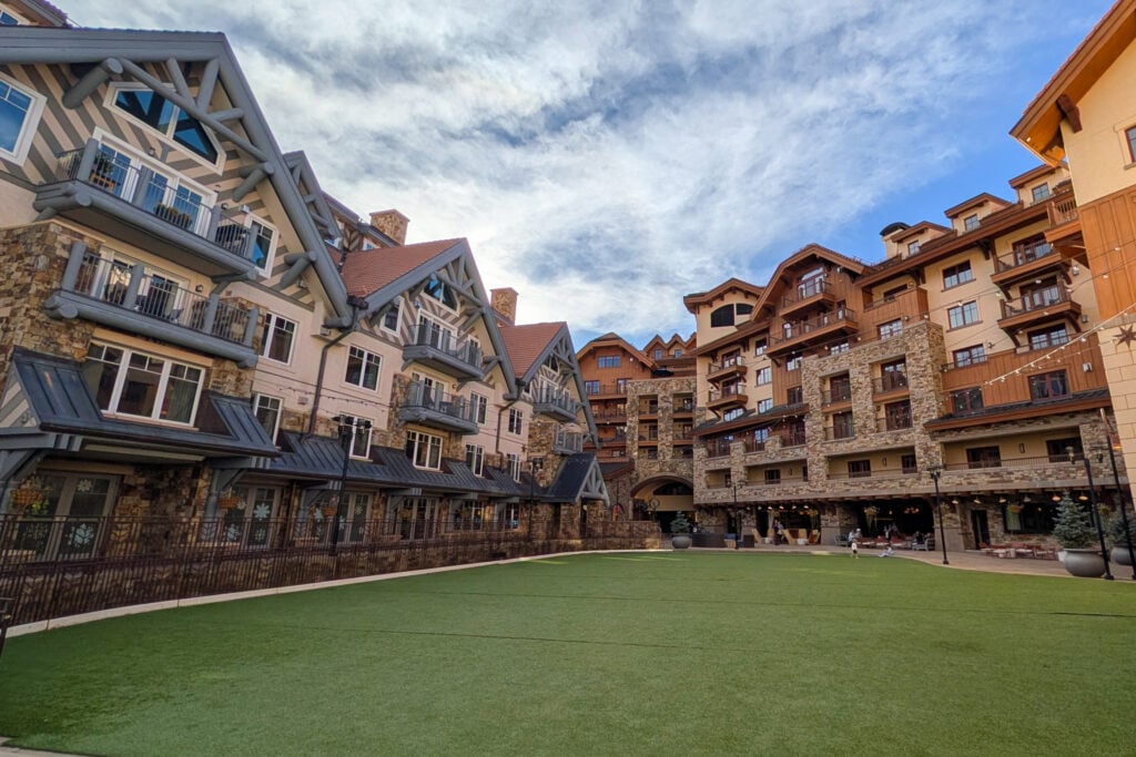 open area behind mountain lodge 