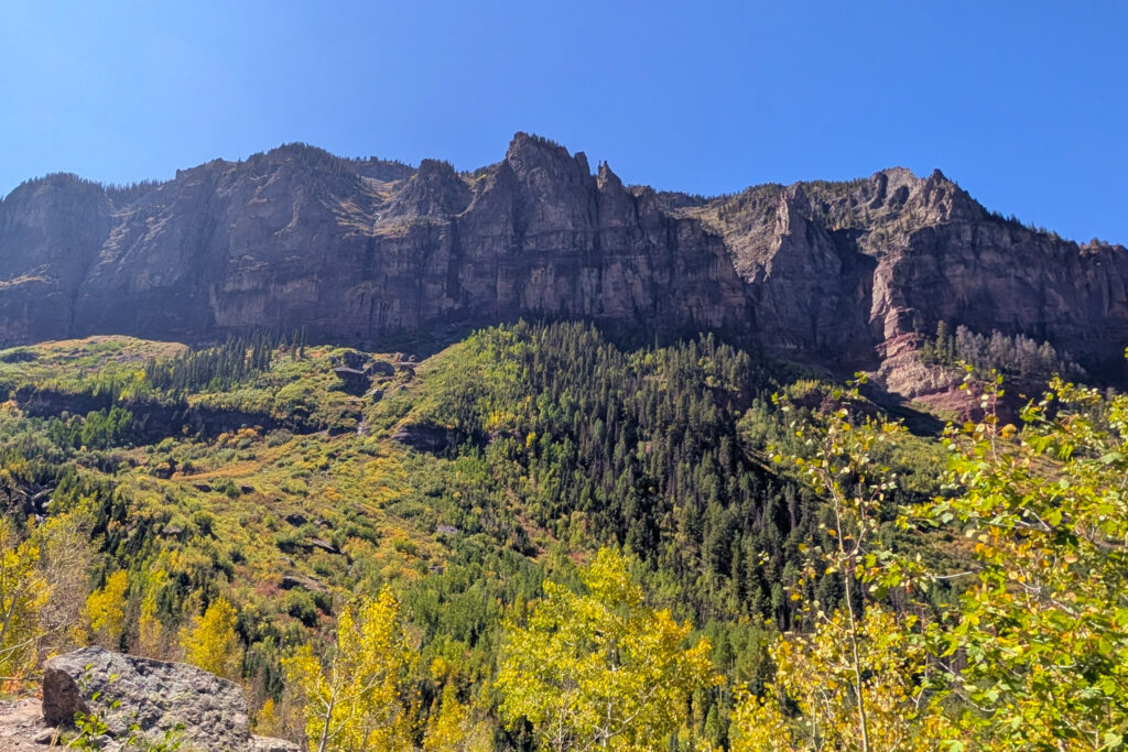 mountains in the distance above trees